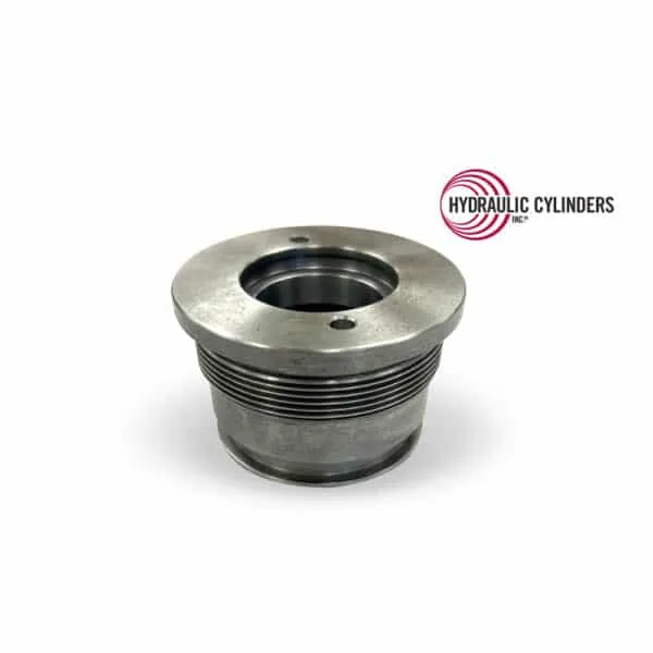 Replacement ductile iron hydraulic cylinder head for Bobcat cylinders. Direct replacement PN 7391301 for compatible Bobcat loader and excavator models. Replacement ductile iron hydraulic cylinder head for Bobcat, PN 7391301, fits Bobcat loaders and excavators