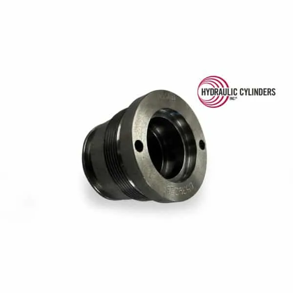 USA-made replacement ductile iron Bobcat cylinder head (PN 6539236) for select skid steers and backhoe attachment cylinders. Replacement ductile iron Bobcat cylinder head, PN 6539236