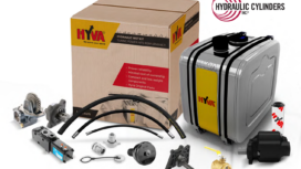 Hyva 2,000 PSI wet kit contents — gear pump, aluminum side-mount oil tank, tip valve, cab controls, hoses, and fittings